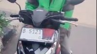 Tilang Polisi: Pelat Nomor Terselubung Masker, Tertangkap!